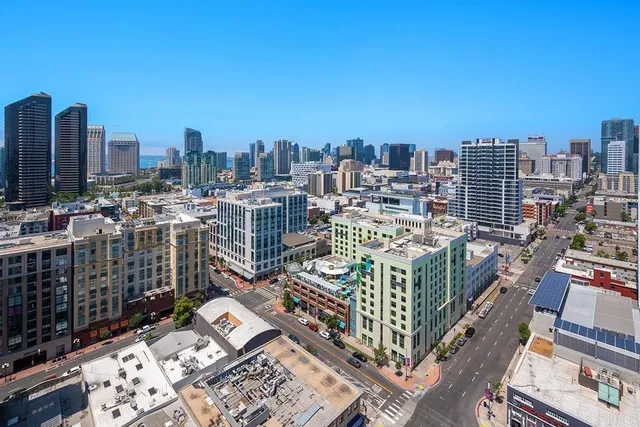 a view of a city with tall buildings