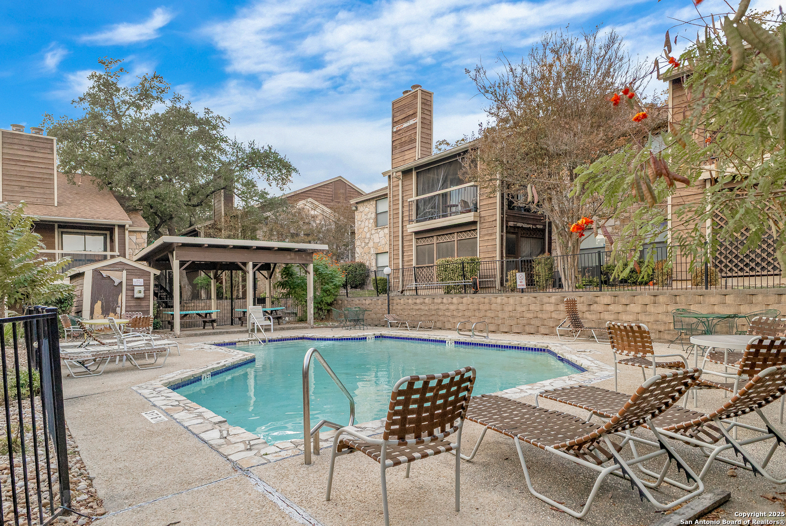 11520 Huebner Road, Unit 201 San Antonio, TX 78230 - Photo 19 of 19 a view of a house with swimming pool and sitting area