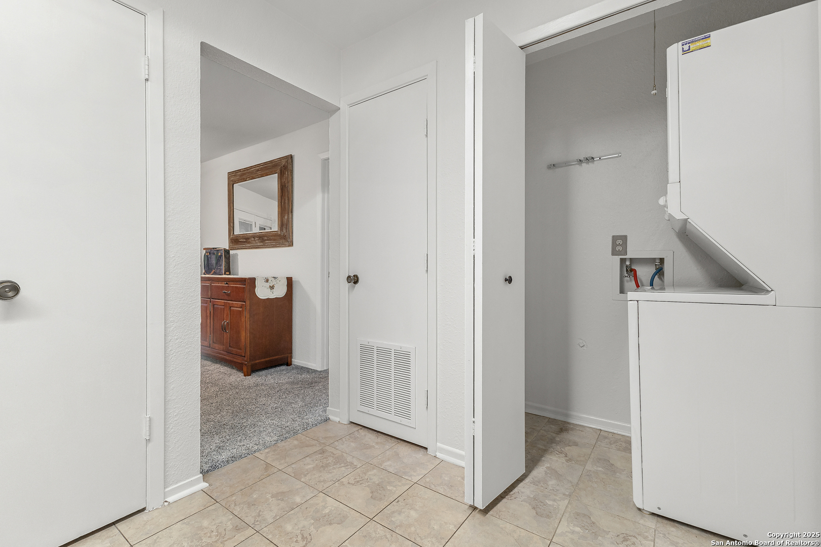 11520 Huebner Road, Unit 201 San Antonio, TX 78230 - Photo 9 of 19 a view of cabinet and utility room
