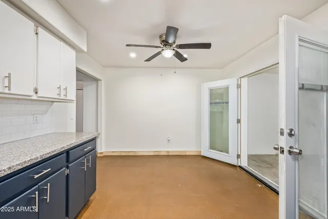 a view of a kitchen with a sink and dishwasher