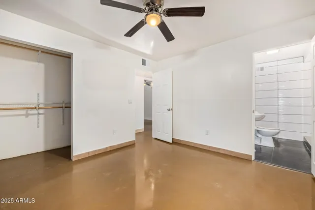 a view of an empty room and window