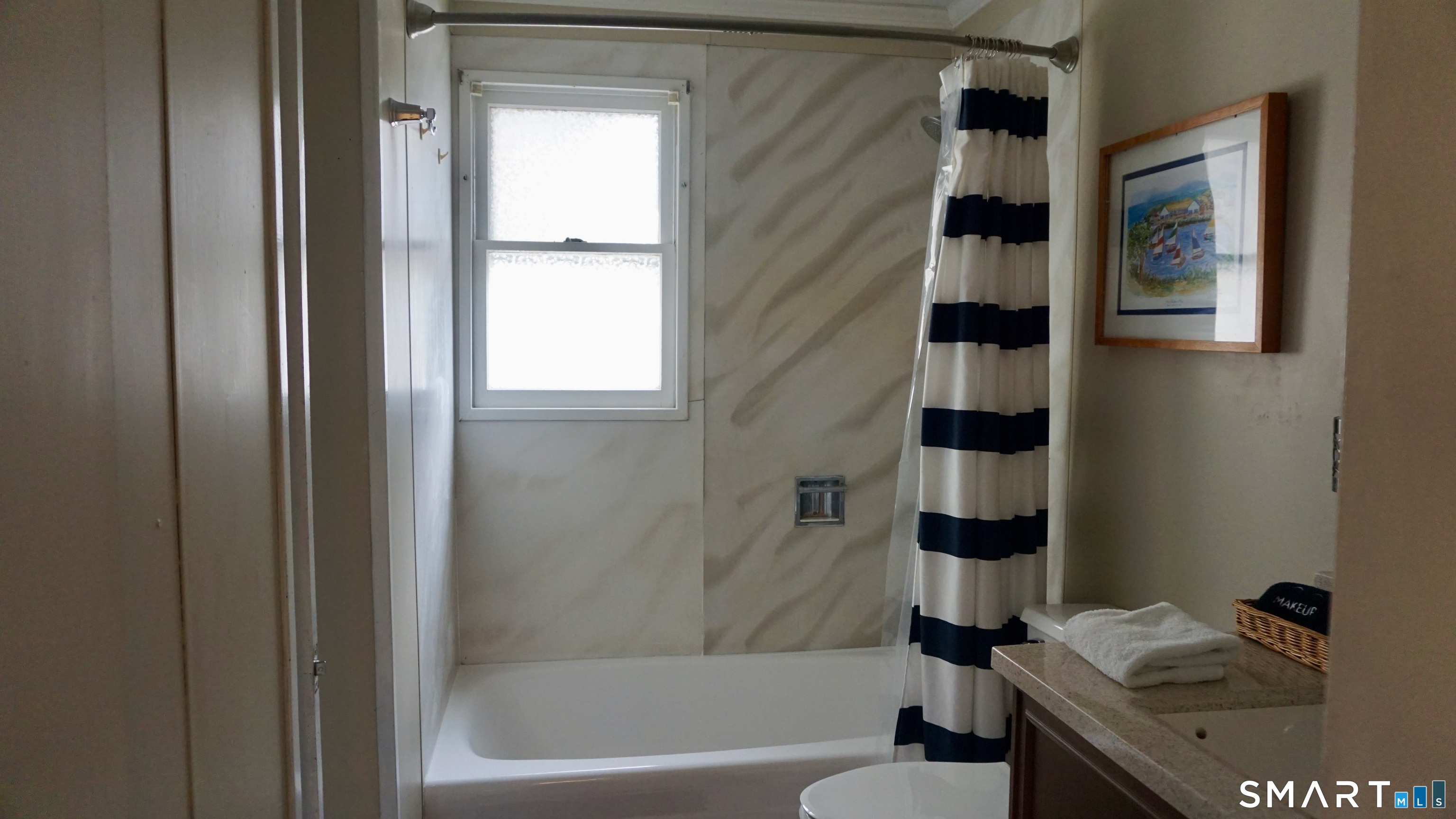 13 Pacific Street Groton, CT 06340 - Photo 31 of 31 a bathroom with a sink and a bathtub