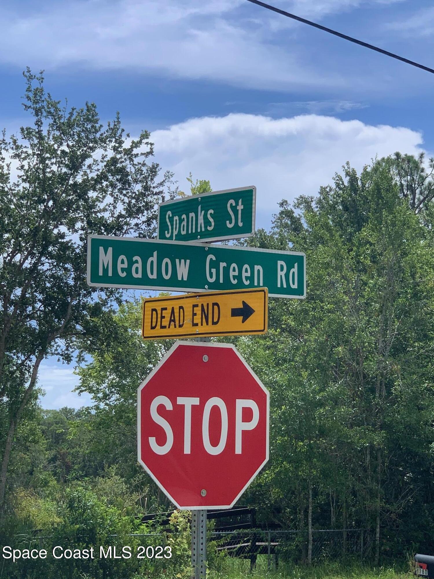 0 Unknown Street Mims, FL 32754 - Photo 10 of 10 a red sign board on a pole