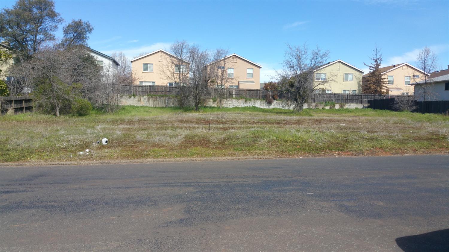 3363 Cimmarron Road Cameron Park, CA 95682 - Photo 1 of 7 a view of a large house with a big yard and large trees
