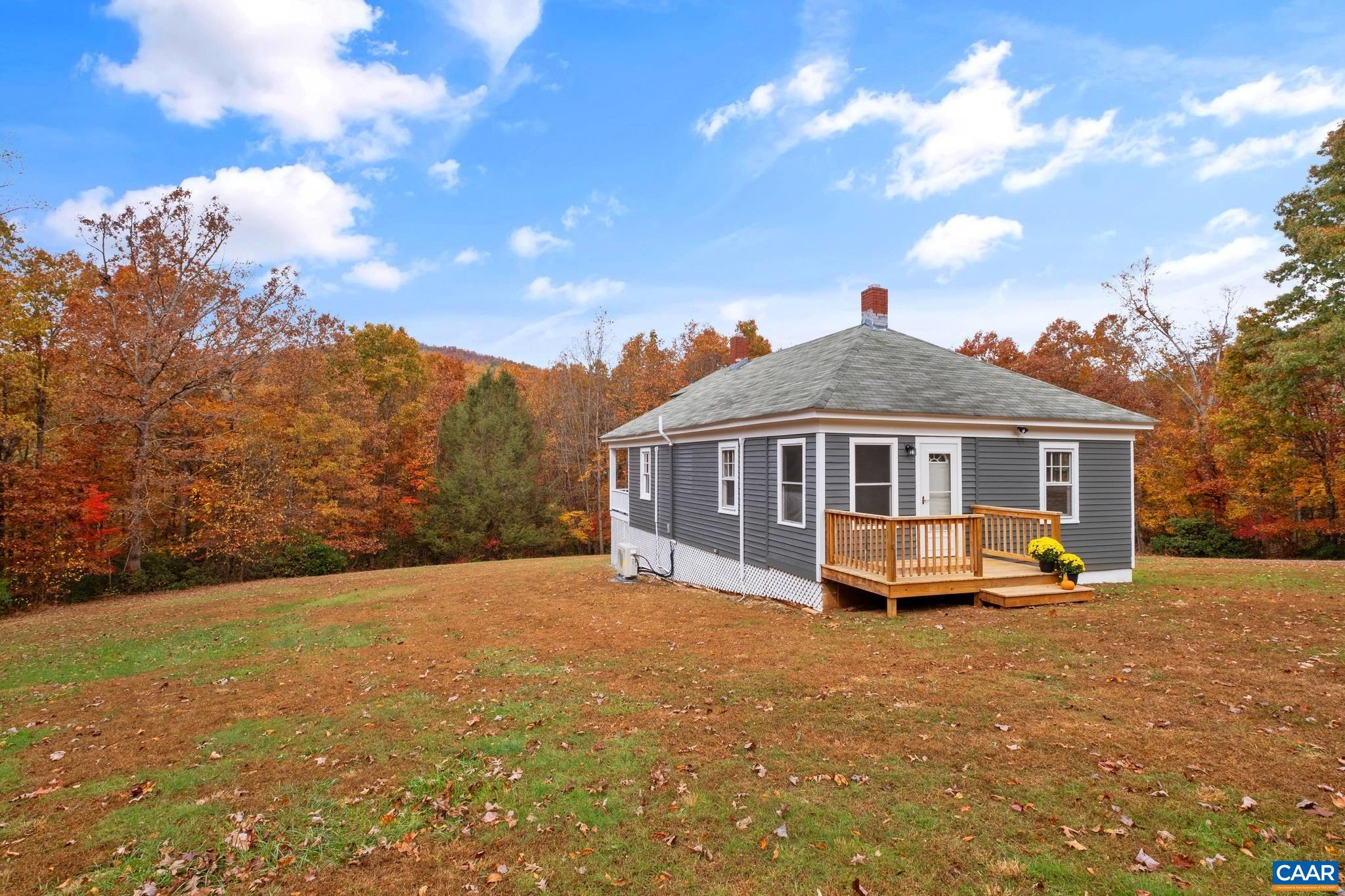 3559 Laurel Road Shipman, VA 22971 - Photo 6 of 38 a front view of a house with a yard
