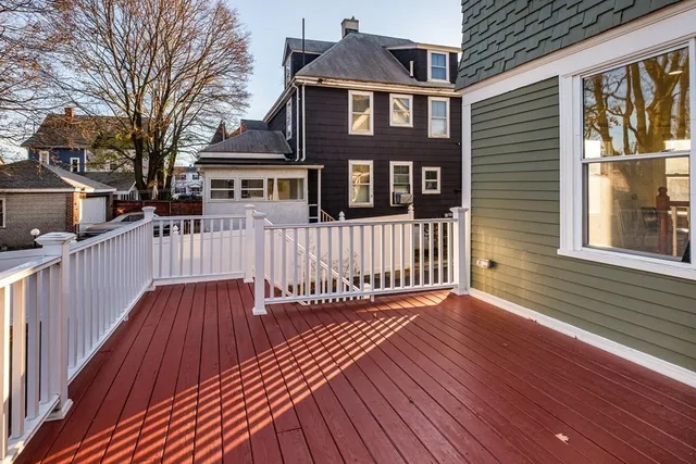 a view of outdoor space with deck and furniture