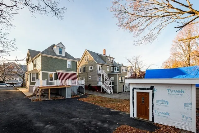 a view of a balcony with wooden floor