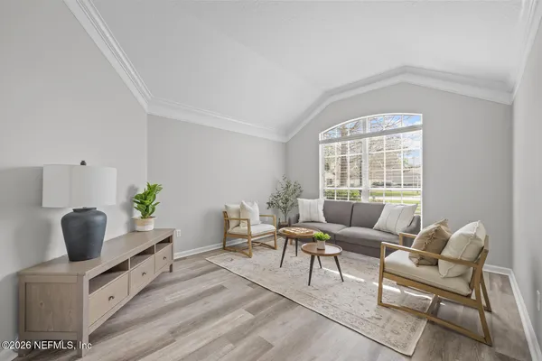 a living room with furniture and a couch