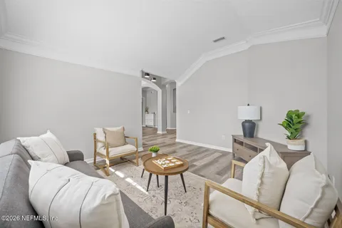 a large kitchen with kitchen island a sink stainless steel appliances and cabinets