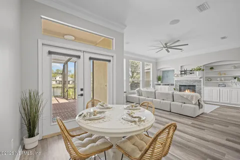 a spacious bathroom with a bathtub sink and mirror