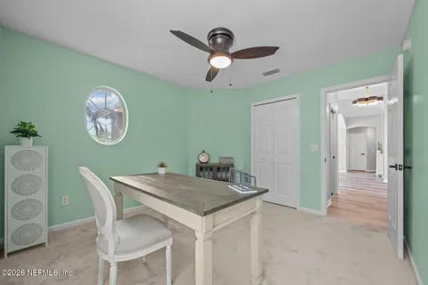 a view of outdoor space with garden and trees