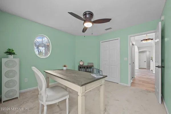 a view of outdoor space with garden and trees