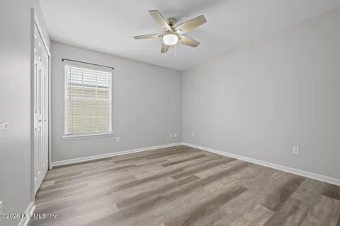 an aerial view of a house with a lake view
