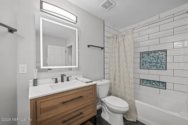 a view of a swimming pool with a outdoor seating