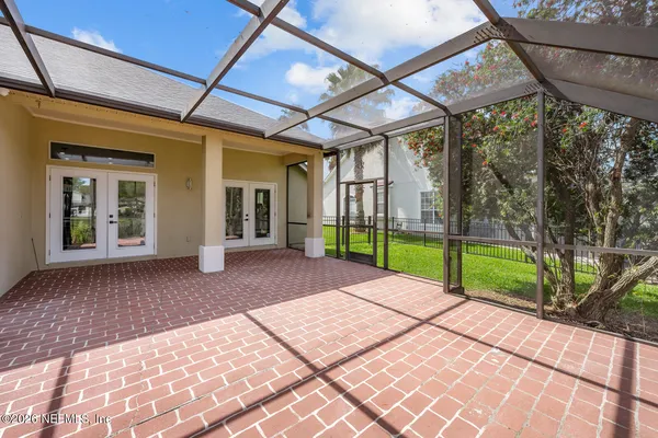 an aerial view of a house with a swimming pool yard and outdoor seating