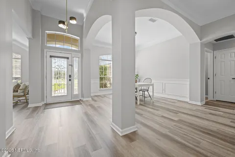 a view of a dining room with furniture window and outside view