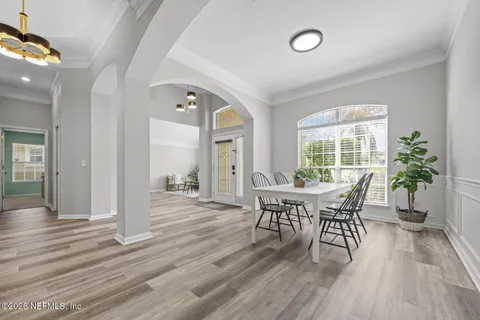 a view of a dining room with furniture