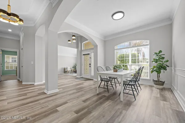 a view of a dining room with furniture