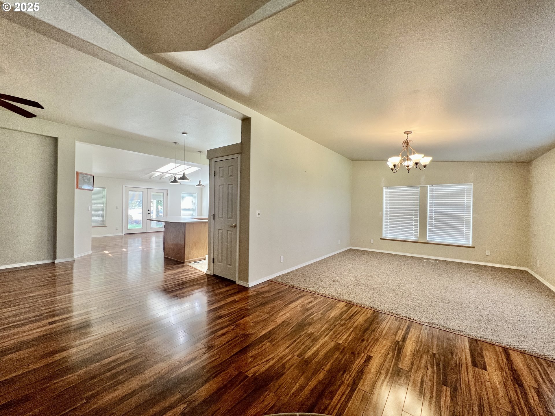 76707 Highway 207 Echo, OR 97826 - Photo 10 of 25 a view of an empty room with window and wooden floor