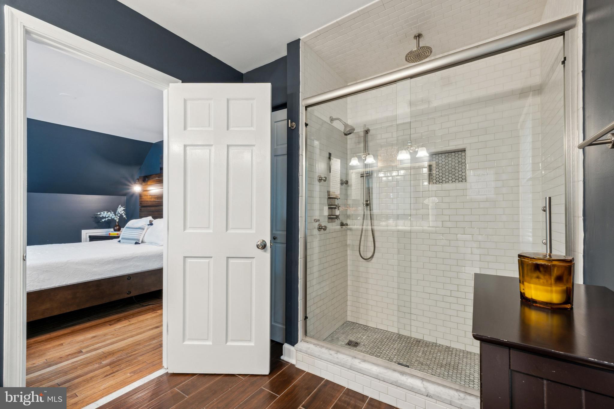 18600 Cabin Road Triangle, VA 22172 - Photo 29 of 39 a bathroom with a bathtub and a shower