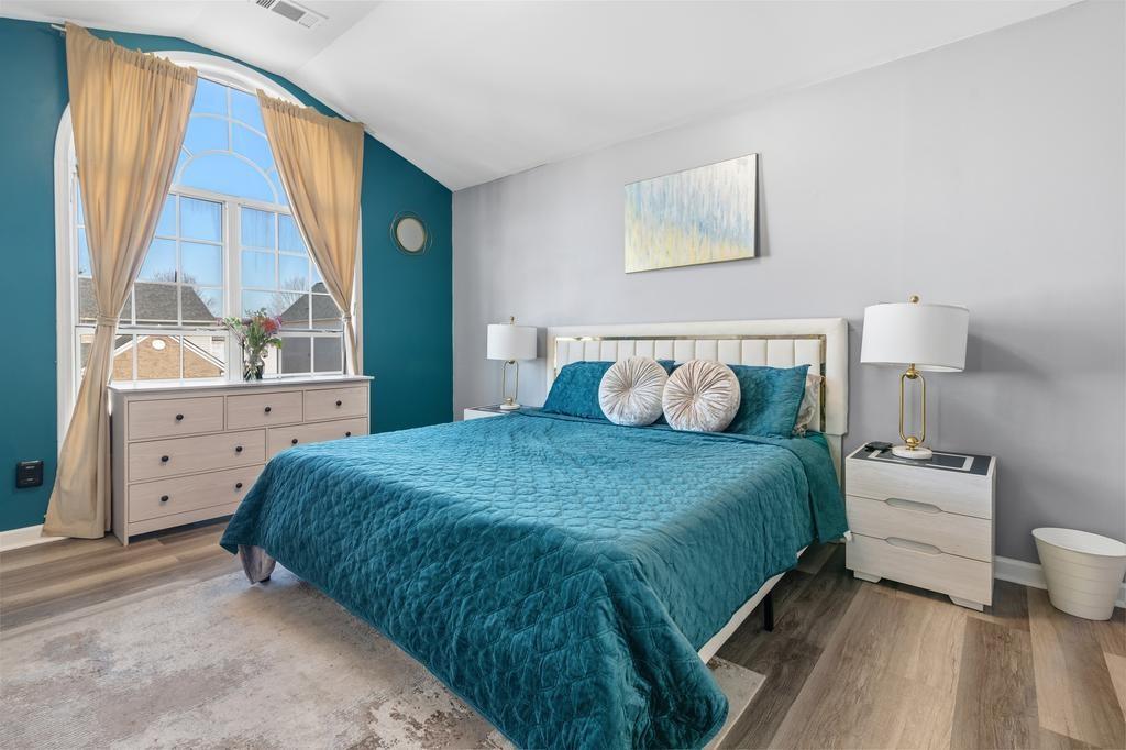 5914 Waggoner Court Rex, GA 30273 - Photo 15 of 23 a bedroom with a bed and window