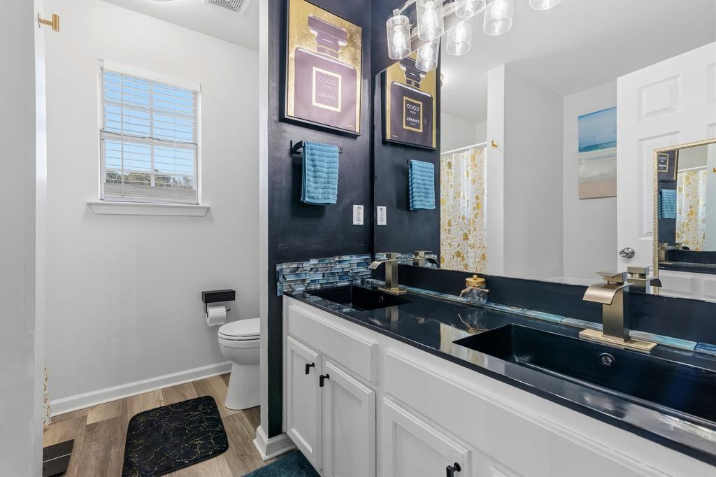 5914 Waggoner Court Rex, GA 30273 - Photo 17 of 23 a kitchen with a sink and cabinets