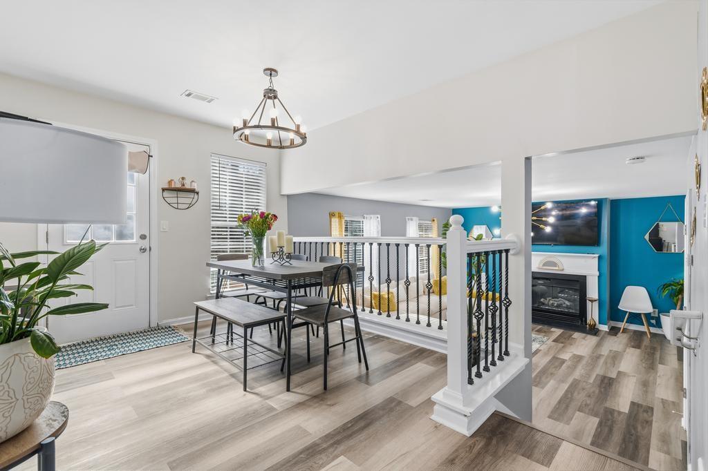 5914 Waggoner Court Rex, GA 30273 - Photo 9 of 23 a view of a dining room with furniture window and wooden floor
