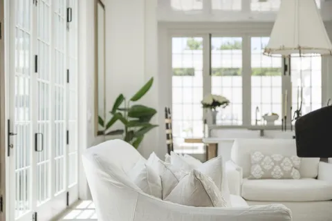 a kitchen with counter top space cabinets and bed