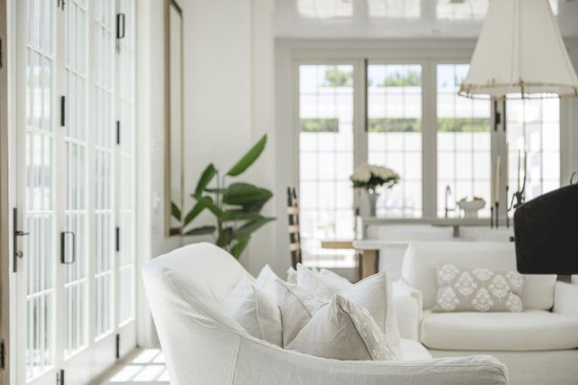 a kitchen with counter top space cabinets and bed