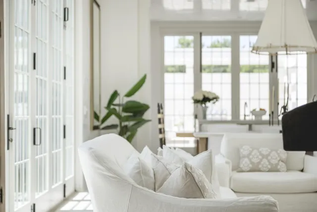 a kitchen with counter top space cabinets and bed