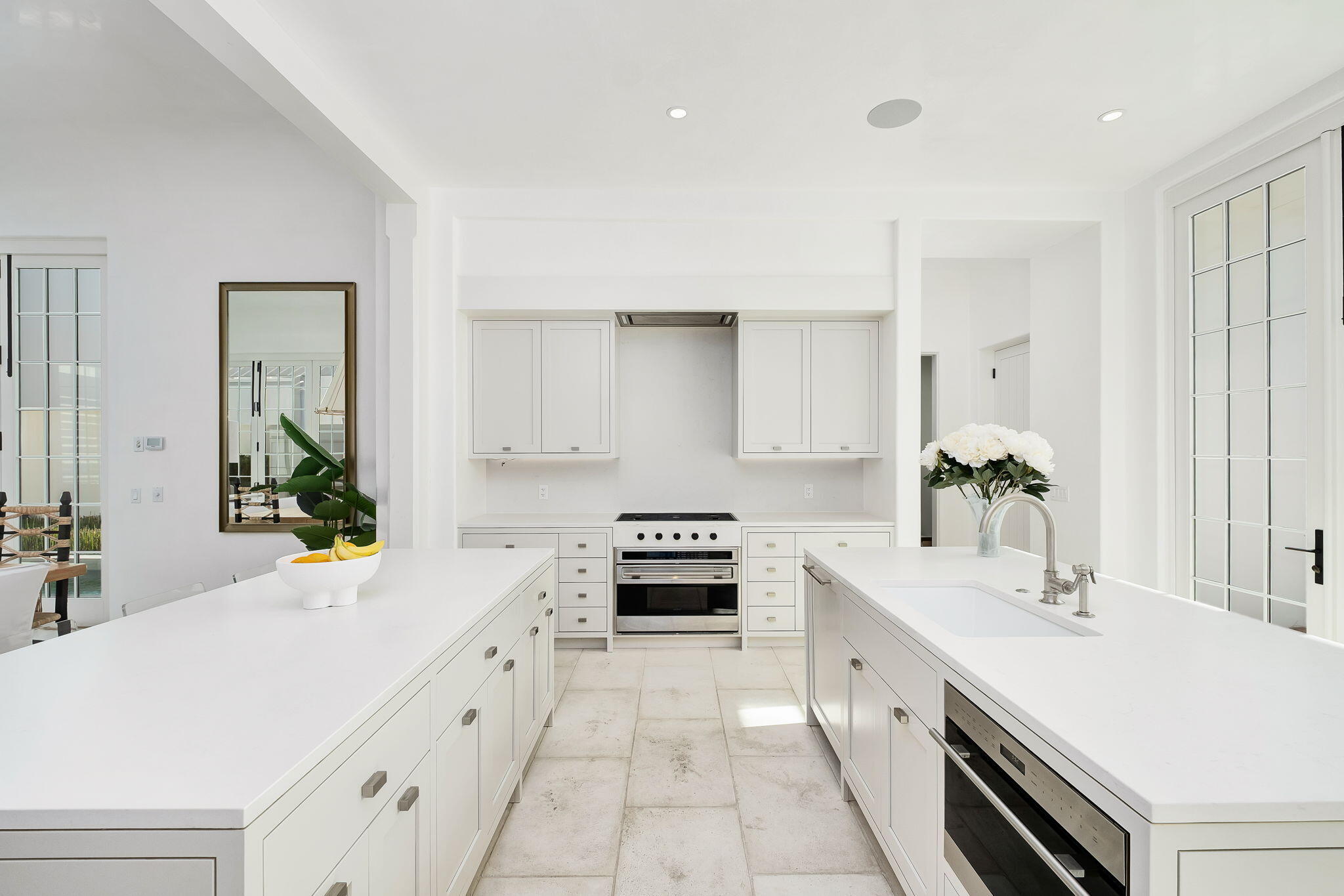 109 Kaiya Avenue Inlet Beach, FL 32461 - Photo 15 of 30 a kitchen with a sink and white cabinets