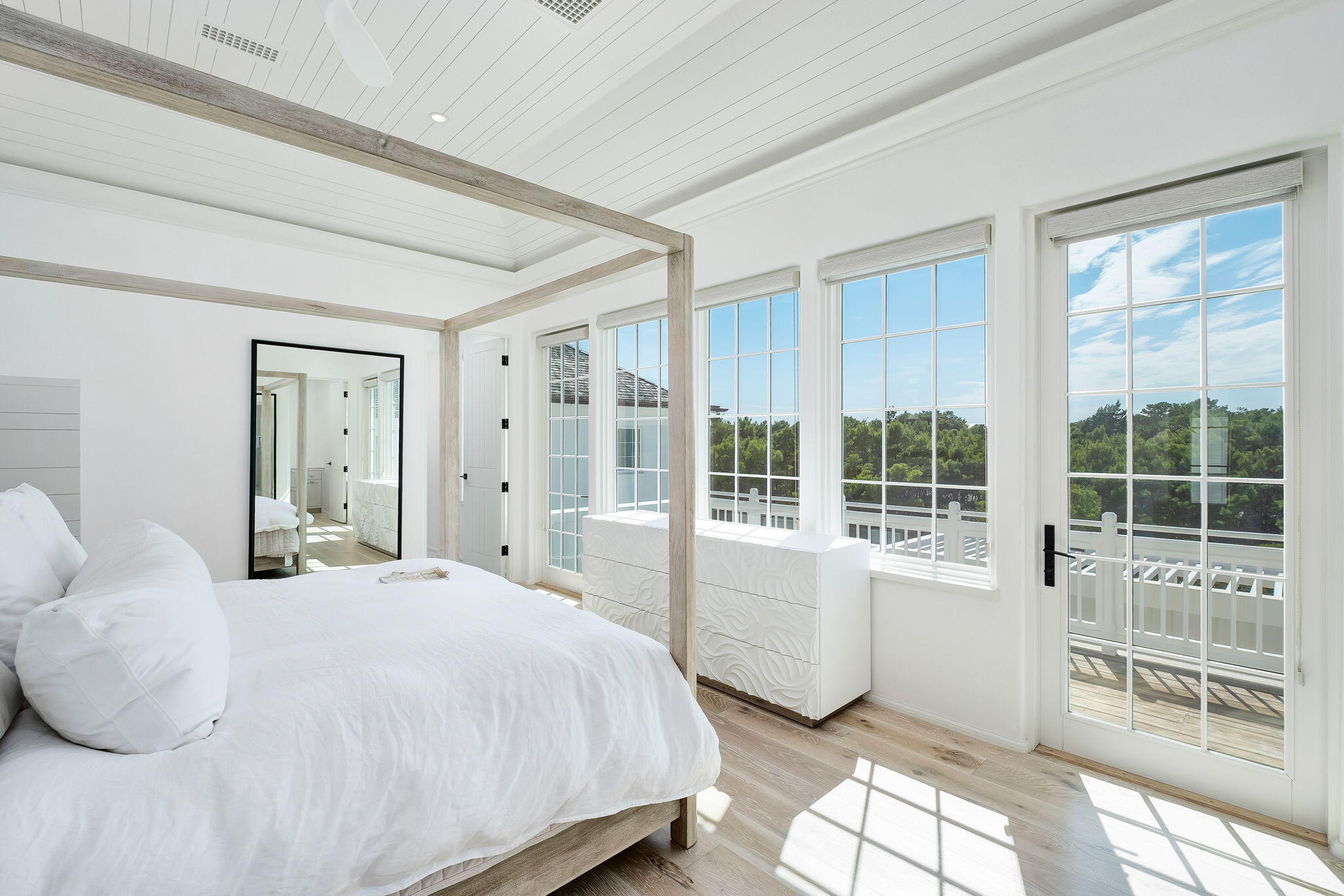 109 Kaiya Avenue Inlet Beach, FL 32461 - Photo 17 of 30 a bedroom with a bed and a large window