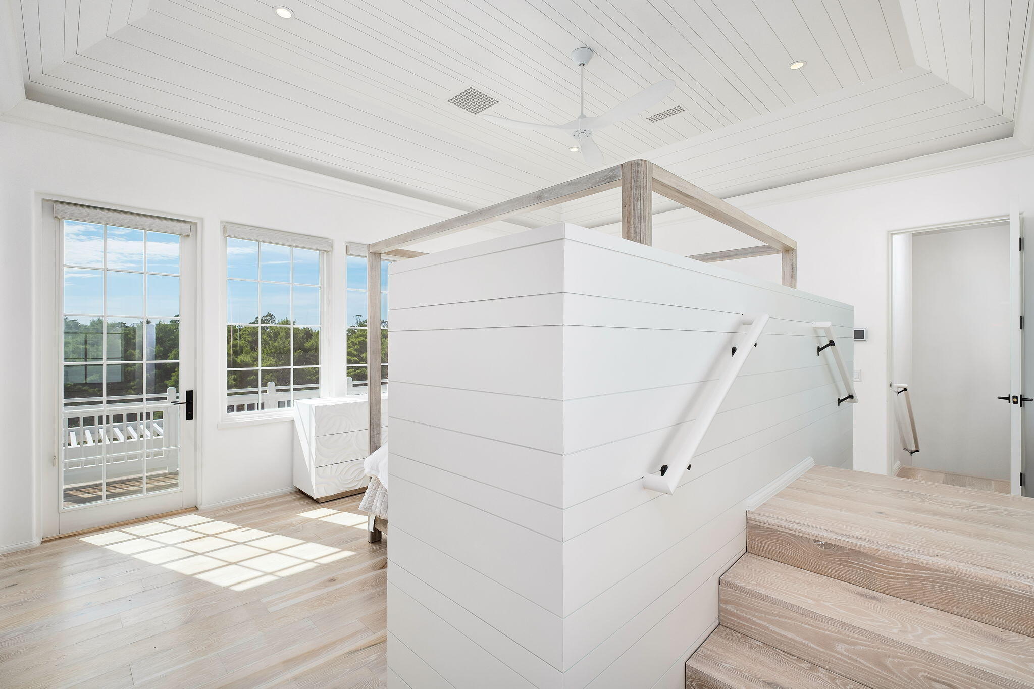 109 Kaiya Avenue Inlet Beach, FL 32461 - Photo 18 of 30 a view of an entryway with wooden floor and windows