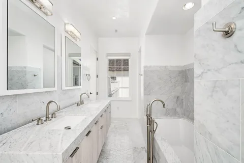 a terrace view with glass windows and garden