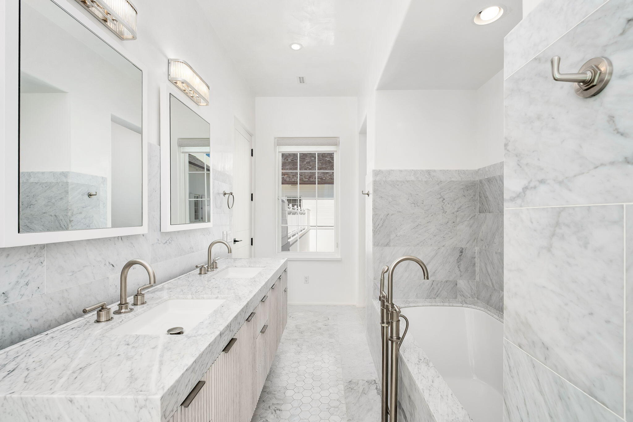 109 Kaiya Avenue Inlet Beach, FL 32461 - Photo 20 of 30 a spacious bathroom with a double vanity sink a mirror and a bathtub