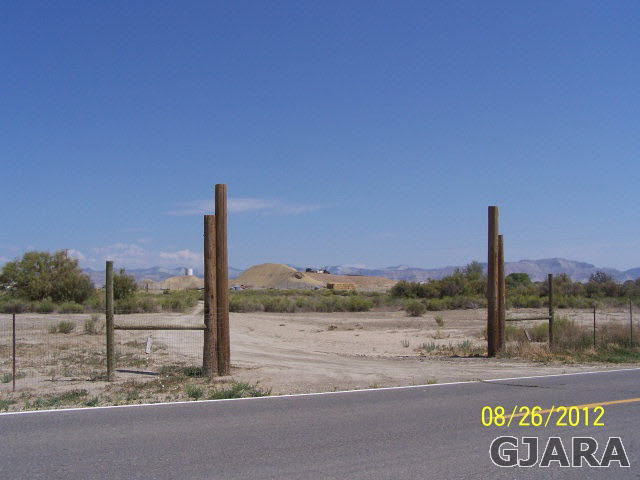 1825 O Road Fruita, CO 81521 - Photo 10 of 11 a view of a street with a building in the background
