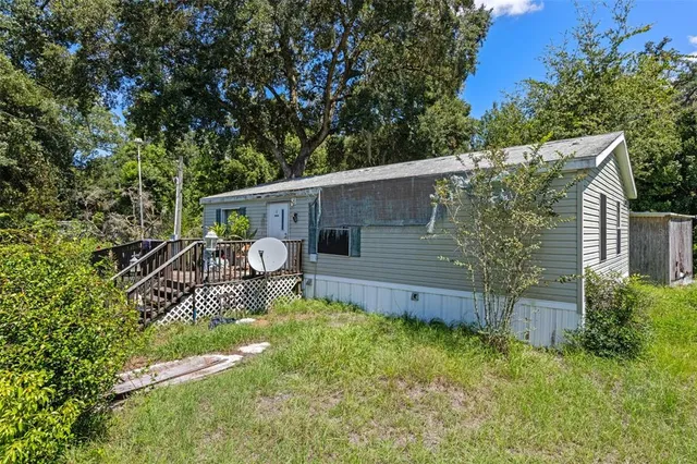 aerial view of a house with a patio