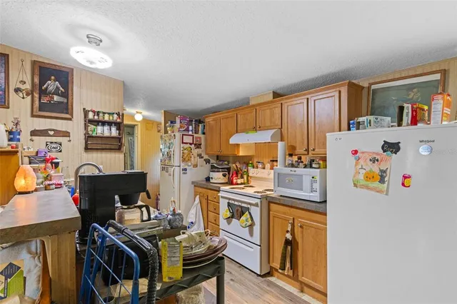 a work place with furniture and a window