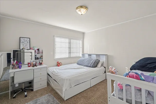 a kitchen with a table chairs and a stove