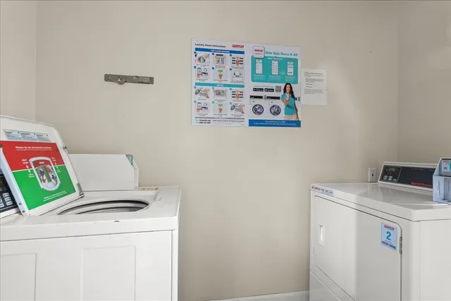 a view of a chairs and table in a balcony