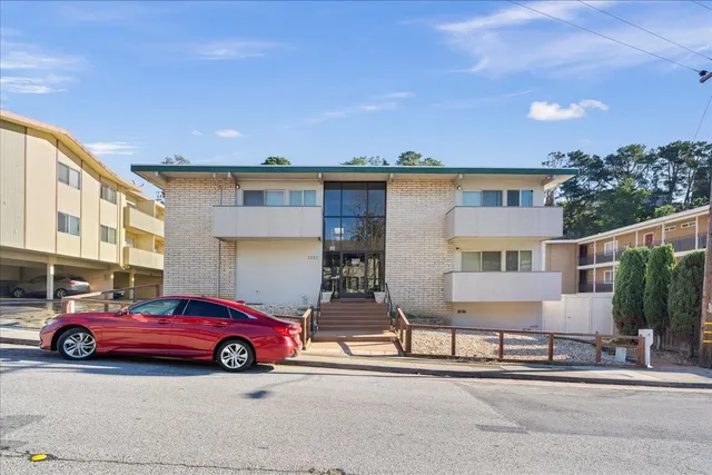 a car parked in front of a house