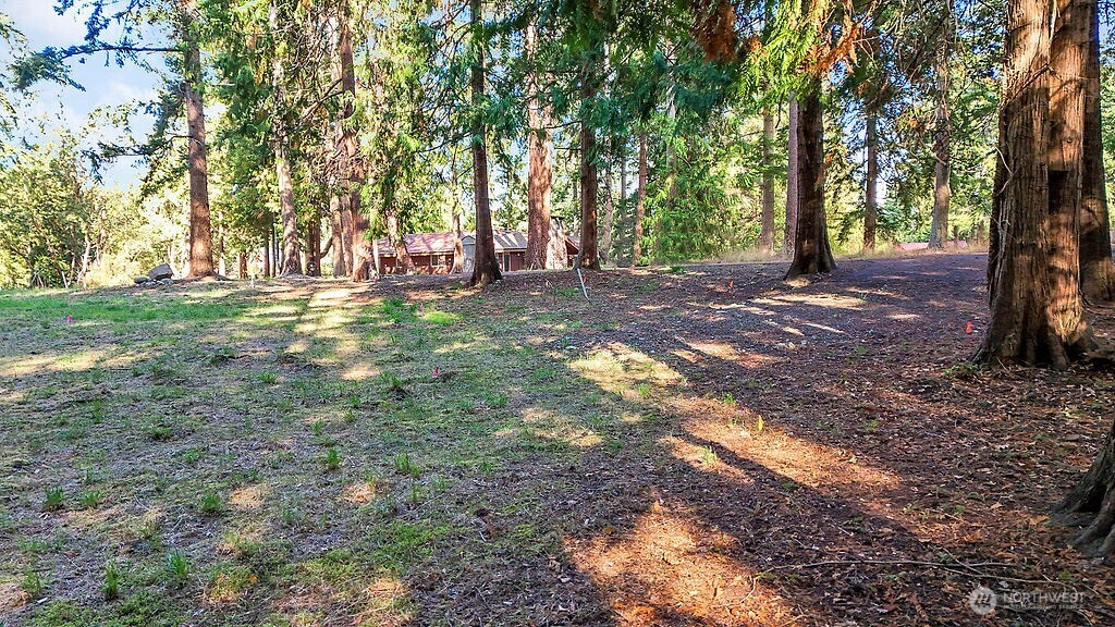 4 T Street Port Townsend, WA 98368 - Photo 3 of 7 a view of outdoor space with deck and trees