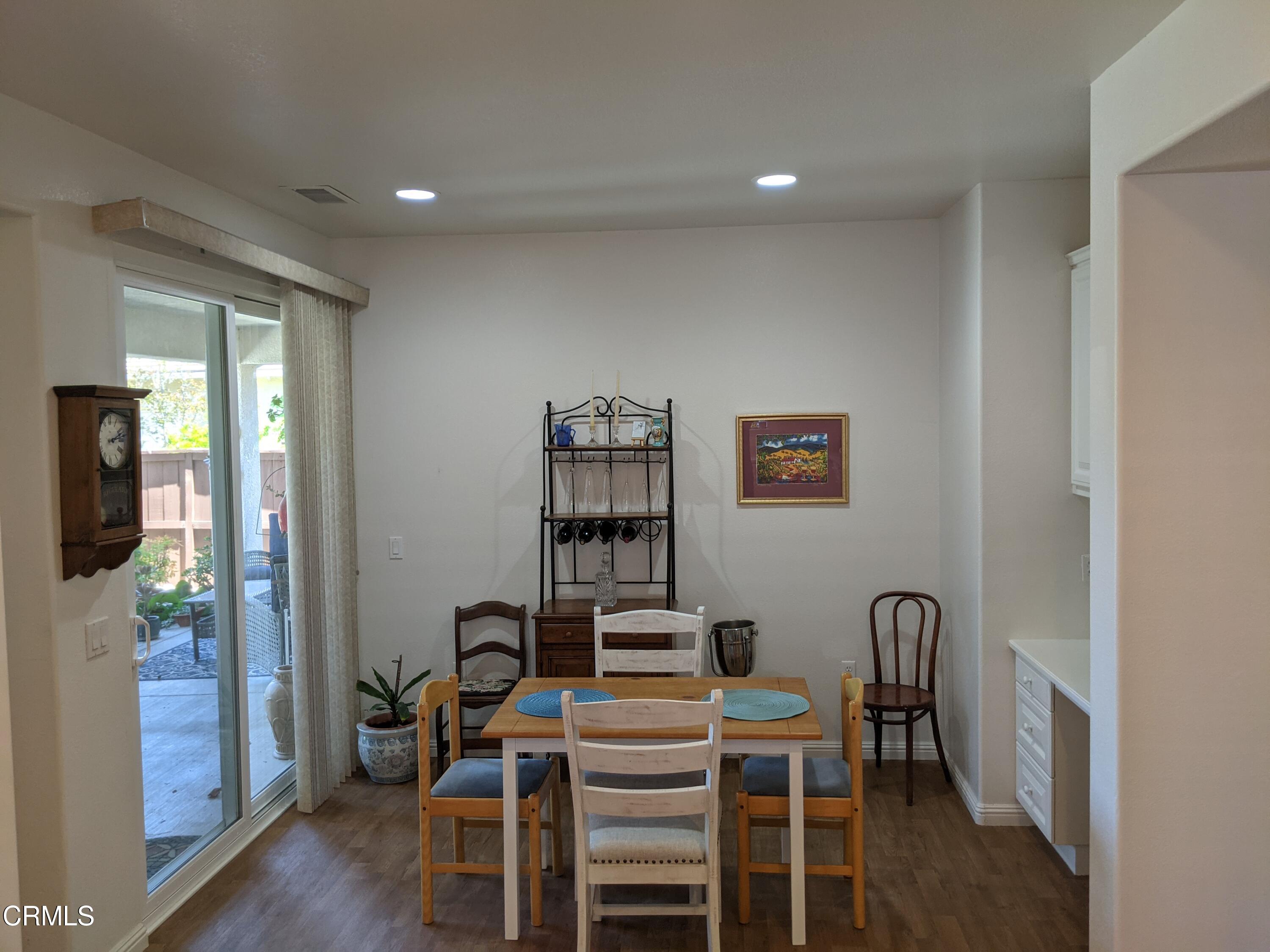 2654 Traditions Loop Paso Robles, CA 93446 - Photo 17 of 32 a view of a dining room with furniture