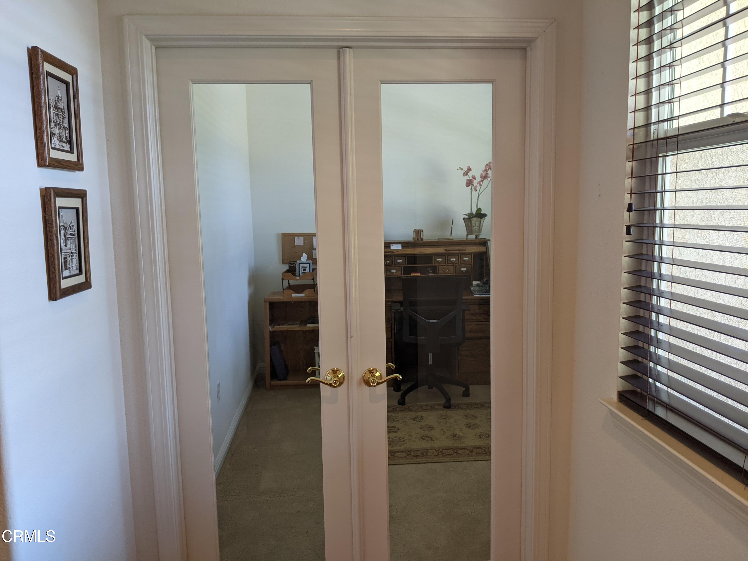 2654 Traditions Loop Paso Robles, CA 93446 - Photo 18 of 32 a view of a bedroom from hallway