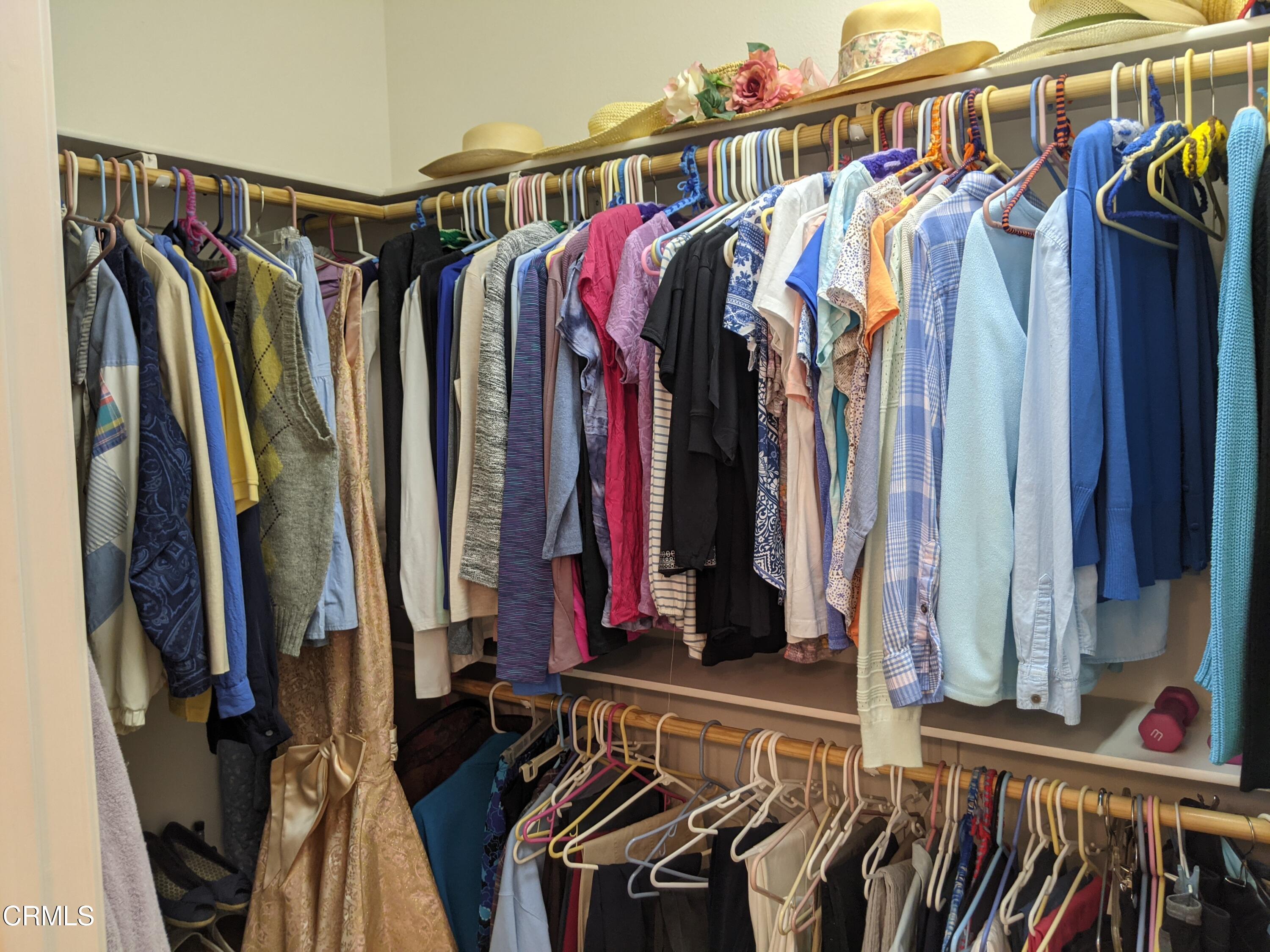 2654 Traditions Loop Paso Robles, CA 93446 - Photo 24 of 32 a view of walk in closet with clothes