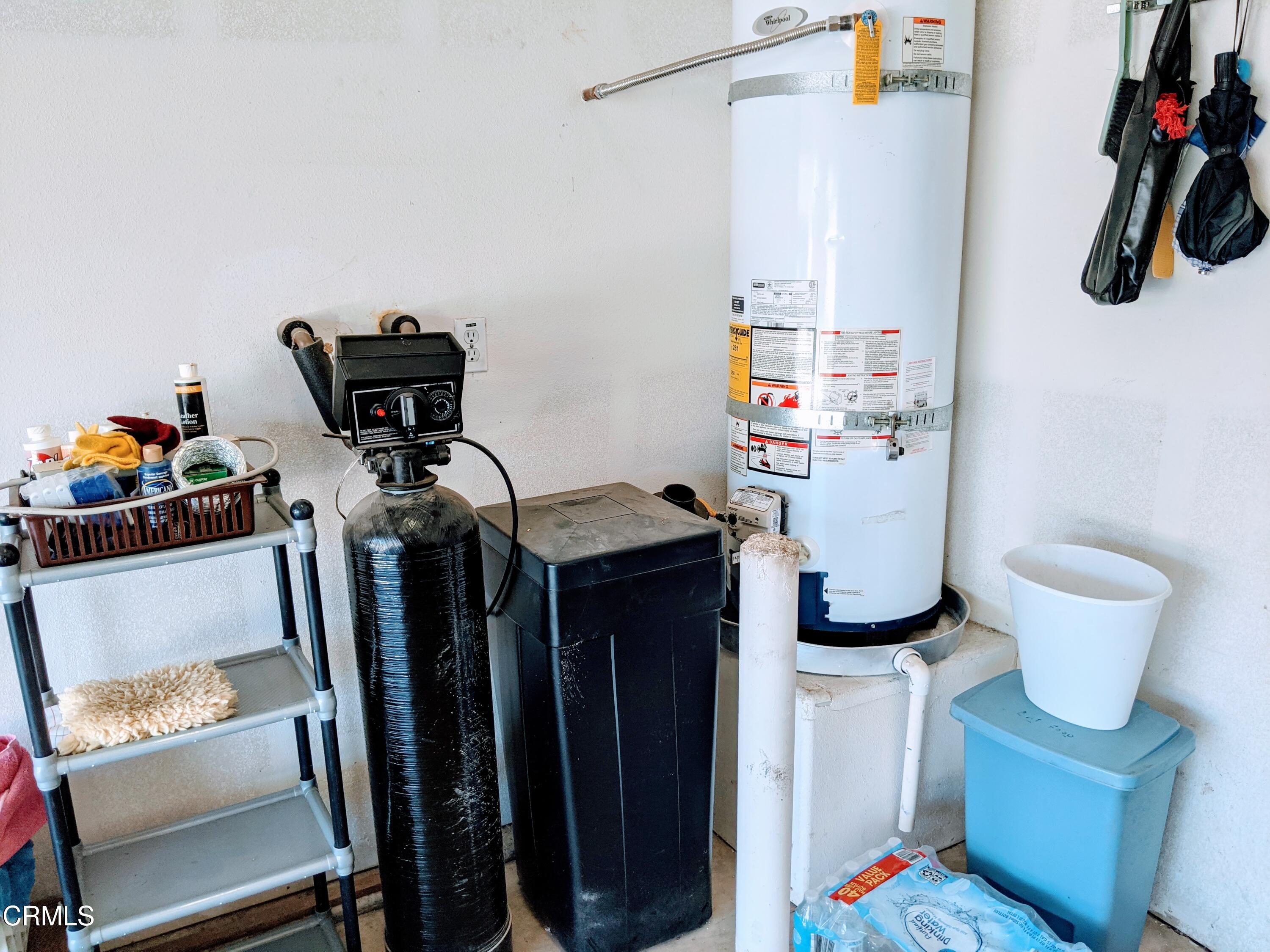 2654 Traditions Loop Paso Robles, CA 93446 - Photo 28 of 32 a view of walk in closet with clothes and shoes