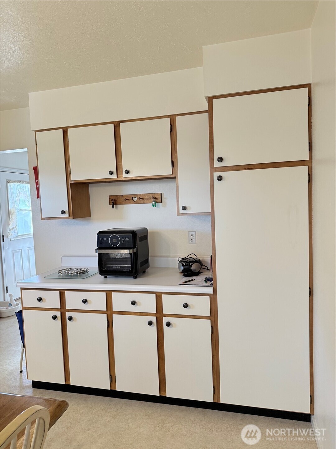 15977 Laney Bros Road East Odessa, WA 99159 - Photo 22 of 33 a kitchen with stainless steel appliances a refrigerator and a stove
