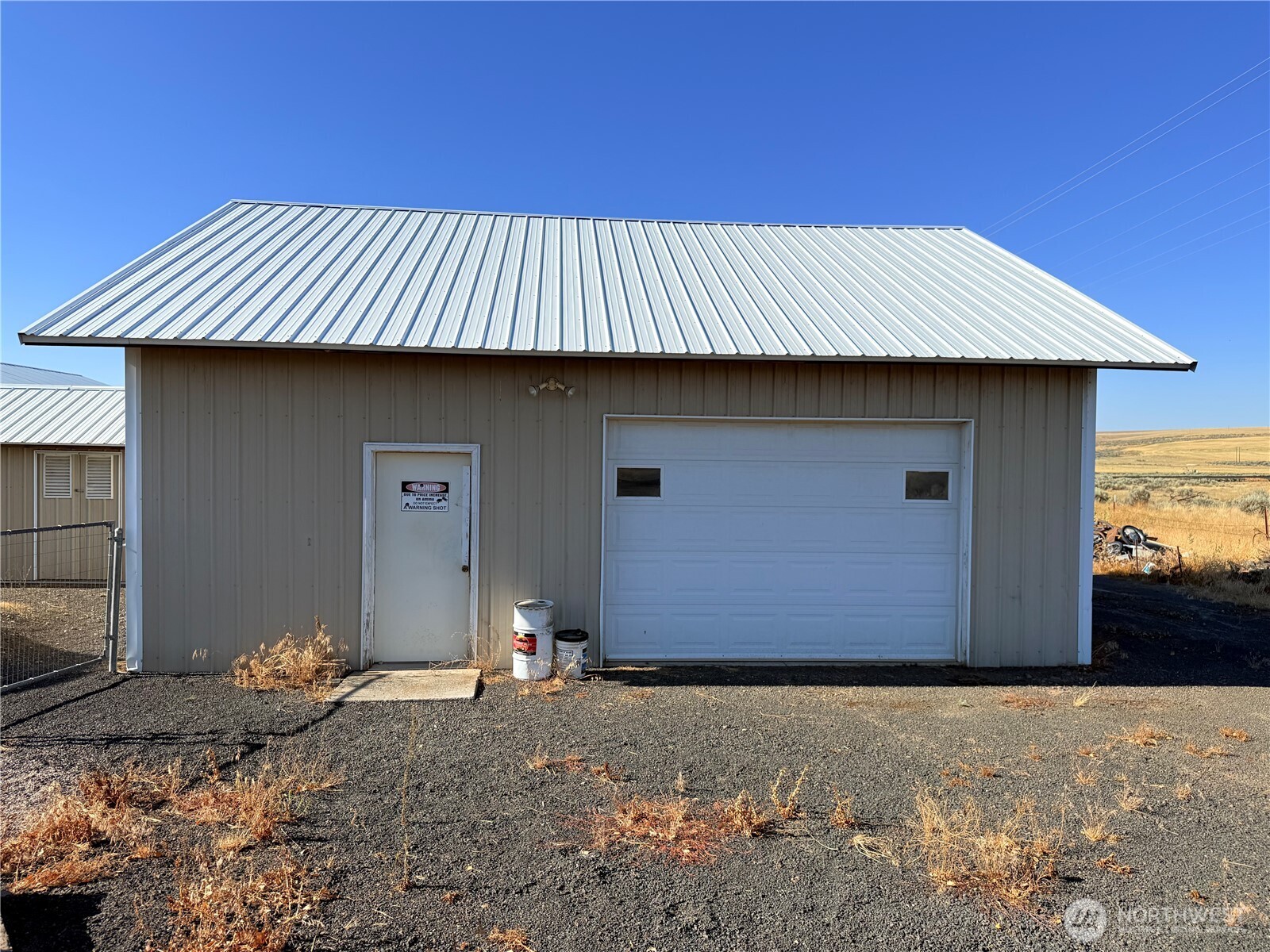 15977 Laney Bros Road East Odessa, WA 99159 - Photo 26 of 33 a backyard of a house