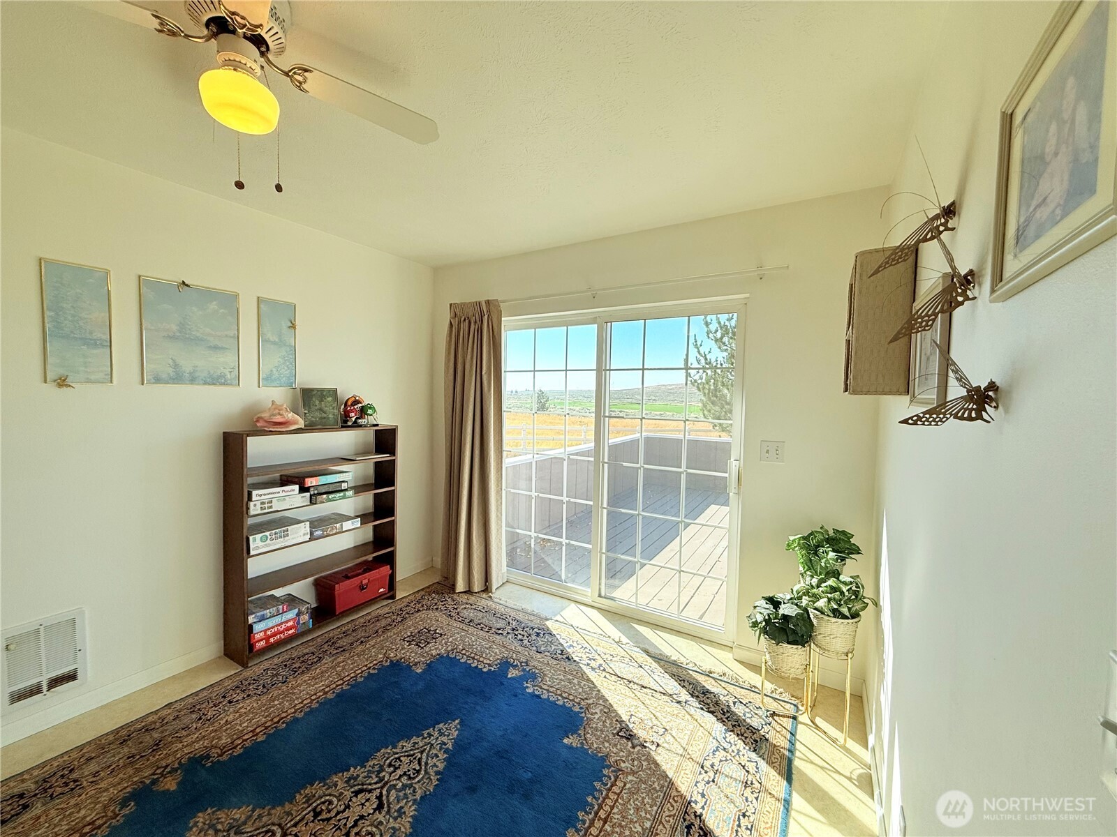 15977 Laney Bros Road East Odessa, WA 99159 - Photo 5 of 33 a bedroom with a bed and a window