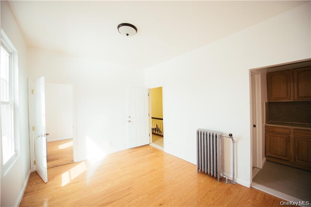 1443 Beach Avenue Bronx, NY 10460 - Photo 22 of 25 a view of a room with a empty space